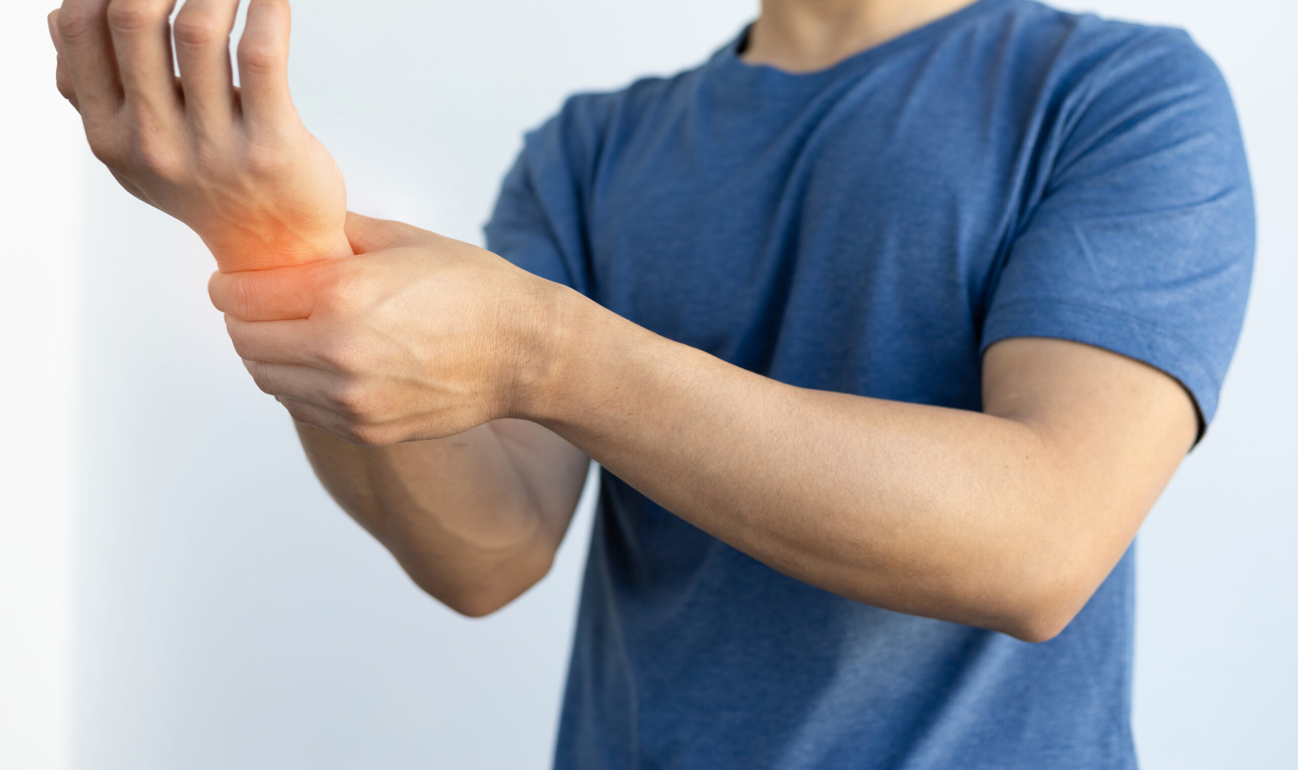 The man had pain in his arm and wrist.